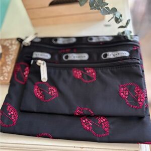 Lesportsac Black Nylon Crossbody Pouch with Hot Pink Lip Print